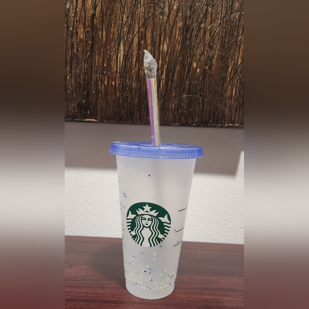 Starbucks Reusable Venti Frosted Cold Cup with blue Lid and wrapped multicoStraw
